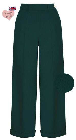 These bottle green high waist wide leg trousers are Inspired by the 30s to 50s period, these gorgeous trousers are made from a mid-weight, slightly stretchy fabric for a better fit and comfort.