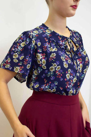Vintage-inspired tie-neck, short, flared sleeve blouse in navy floral | 1930s and 40s Style | Weekend Doll 
